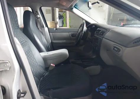 2000 Ford Taurus Lx z USA, uszkodzony, nr VIN 1FAFP52U2YA109560